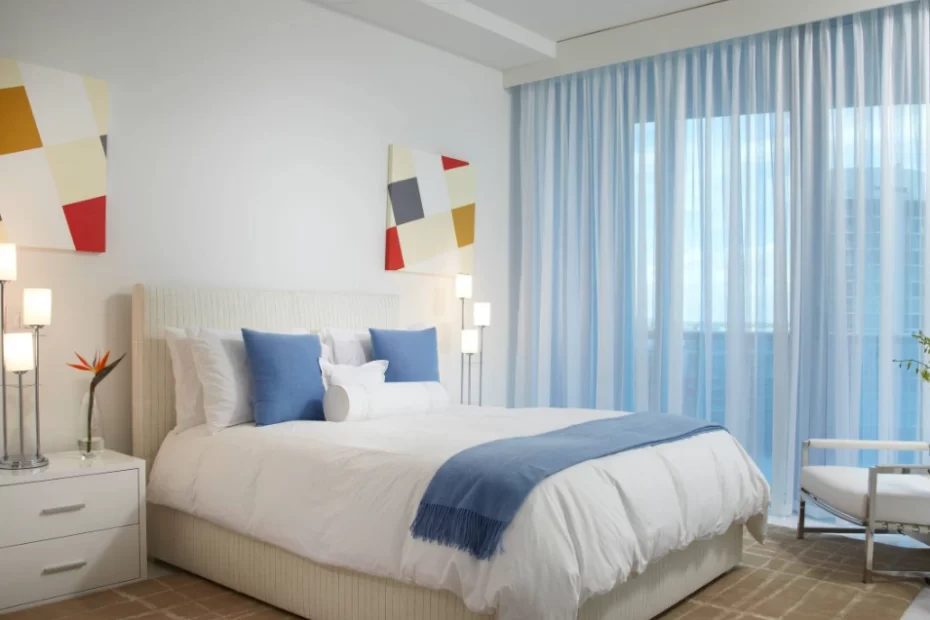 bedroom sheer curtains over roller blinds